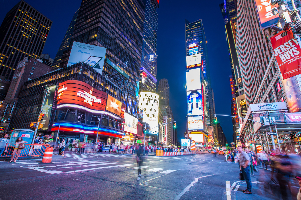 Times Square and Broadway Theaters at night is one of  the most tourist visited location in New York City on June 24, 2014.